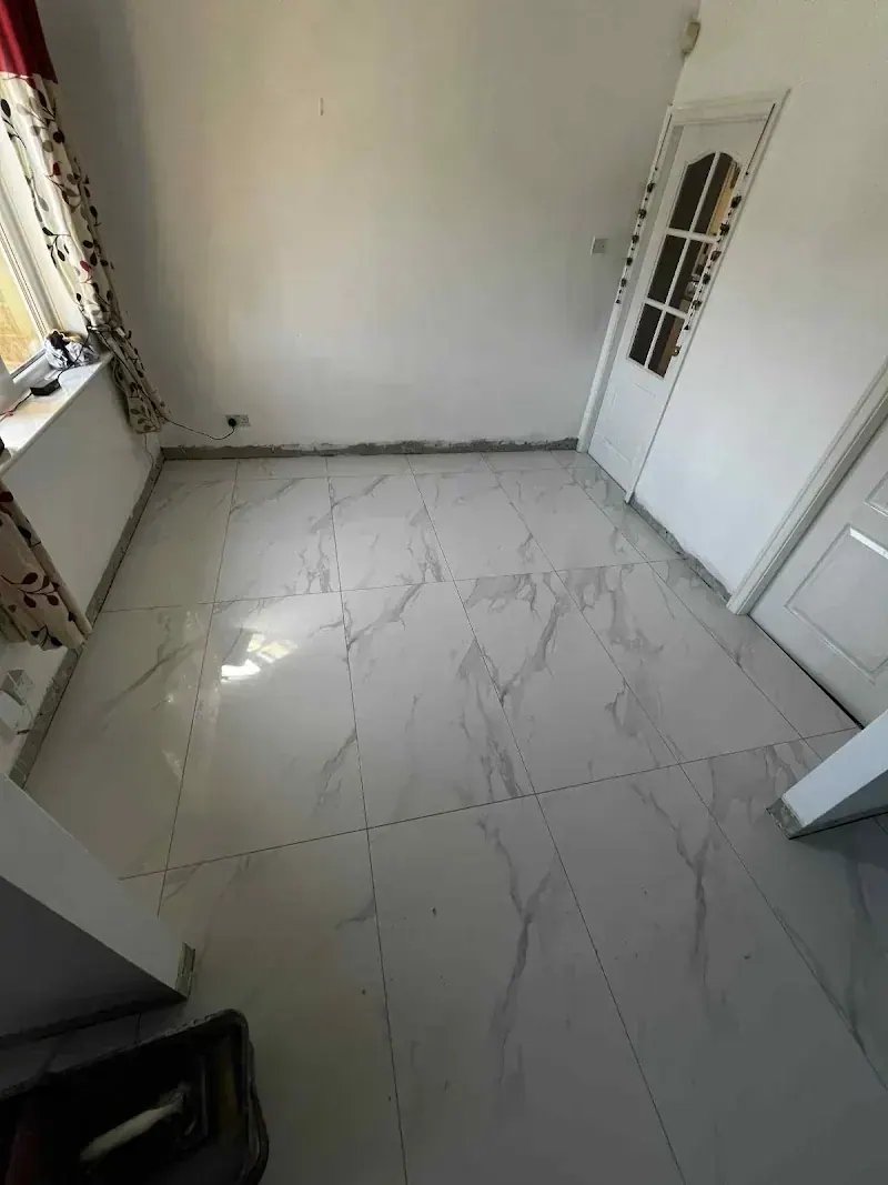 Finished porcelain tiled floor suitable for underfloor heating by Baldwin's